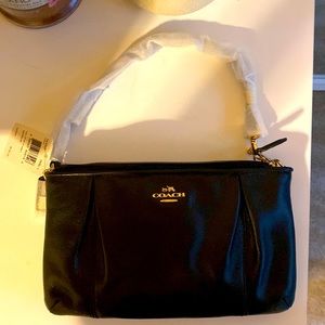 AUTHENTIC COACH BLACK LEATHER CLUTCH.